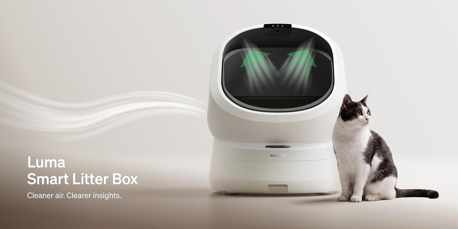 Dog and cat sitting beside a PETLIBRO smart feeder