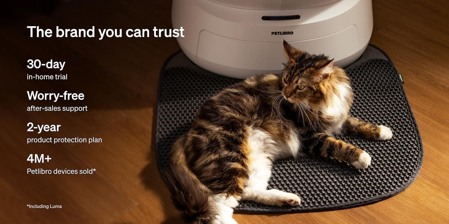 Dog and cat sitting beside a PETLIBRO smart feeder